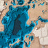 Close-up of laser-cut Big Cormorant Lake map showing shoreline and engraved labels